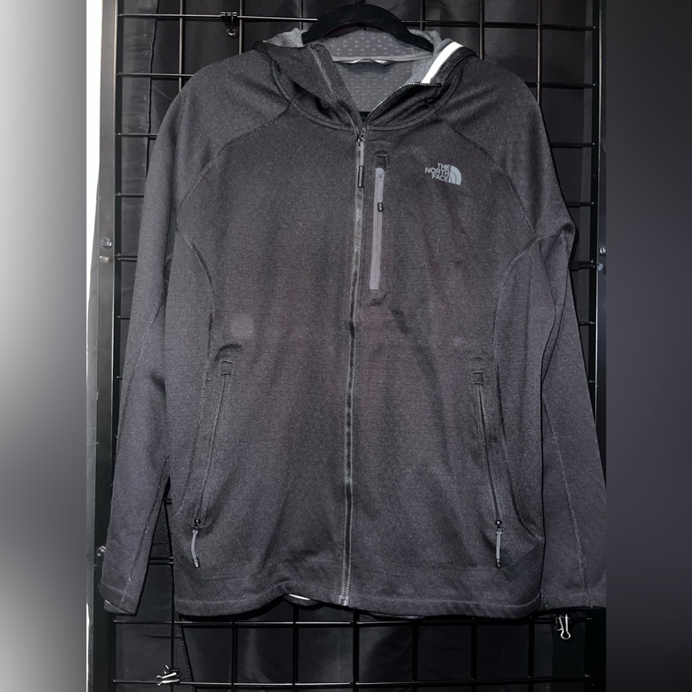North face in the zip up jacket